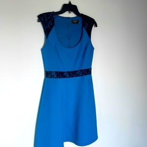 Super cute guess dress size 8 but fits more like a 4-6 blue with black lace